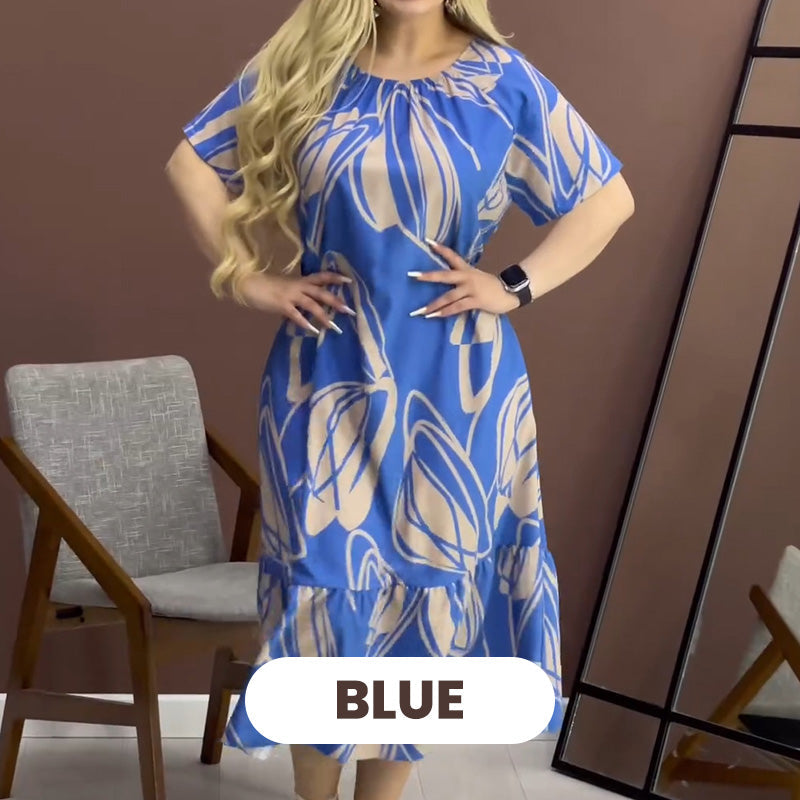 Elegantes, fließendes Kleid mit Rundhalsausschnitt und Print