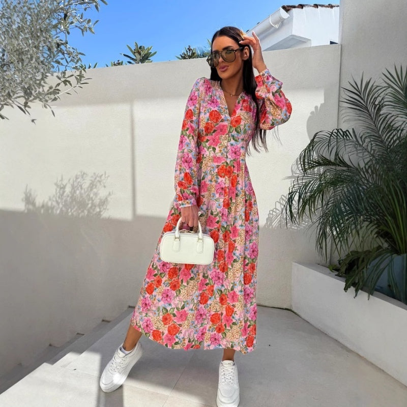 Modisches, langärmeliges, taillenbetontes Blumenkleid mit V-Ausschnitt und Knopfleiste