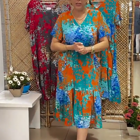 Bedrucktes Damenkleid mit V-Ausschnitt und plissiertem Saum