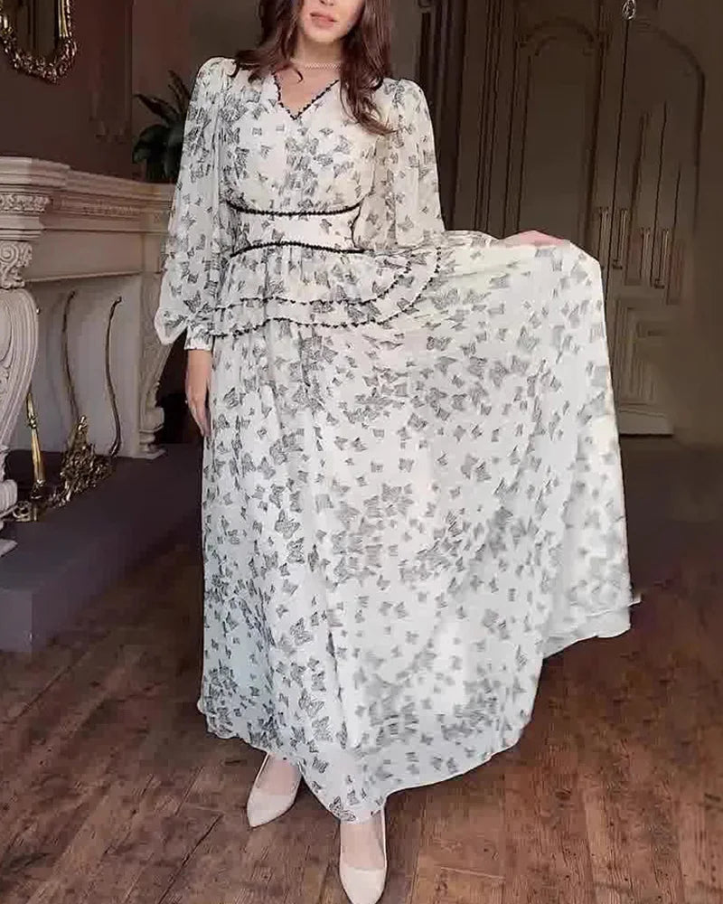 Elegantes Kleid mit bedrucktem Taillenbereich und V-Ausschnitt