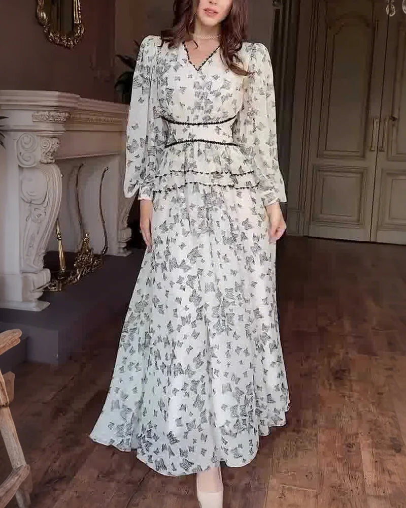 Elegantes Kleid mit bedrucktem Taillenbereich und V-Ausschnitt