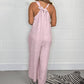 Ärmelloser Jumpsuit mit V-Ausschnitt und weitem Bein und langen Hosen