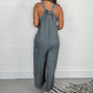 Ärmelloser Jumpsuit mit V-Ausschnitt und weitem Bein und langen Hosen
