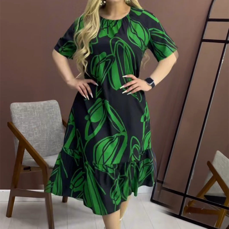 Elegantes, fließendes Kleid mit Rundhalsausschnitt und Print