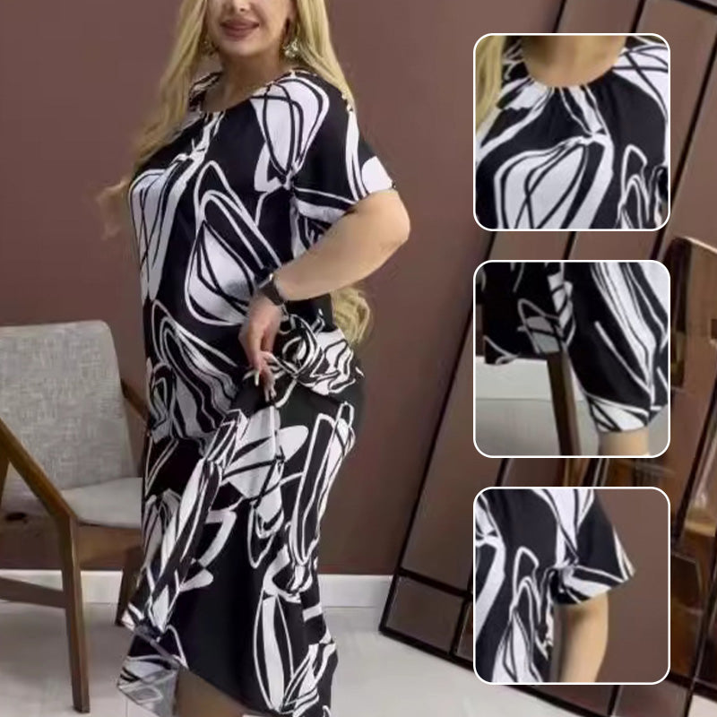Elegantes, fließendes Kleid mit Rundhalsausschnitt und Print