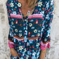 Lässiges Kleid mit Blumenmuster, V-Ausschnitt und Knopfverschluss