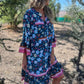 Lässiges Kleid mit Blumenmuster, V-Ausschnitt und Knopfverschluss