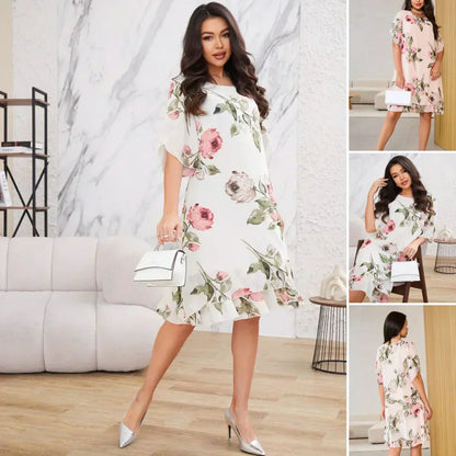Fließendes Chiffonkleid mit blush-farbigen Blütenblättern