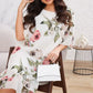 Fließendes Chiffonkleid mit blush-farbigen Blütenblättern