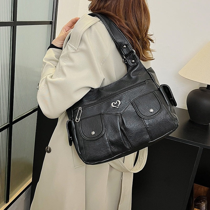 Damen-Tragetasche aus weichem Leder mit mehreren Taschen