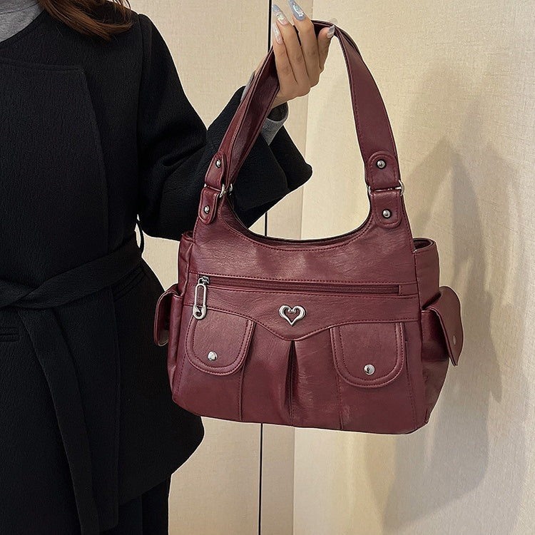 Damen-Tragetasche aus weichem Leder mit mehreren Taschen