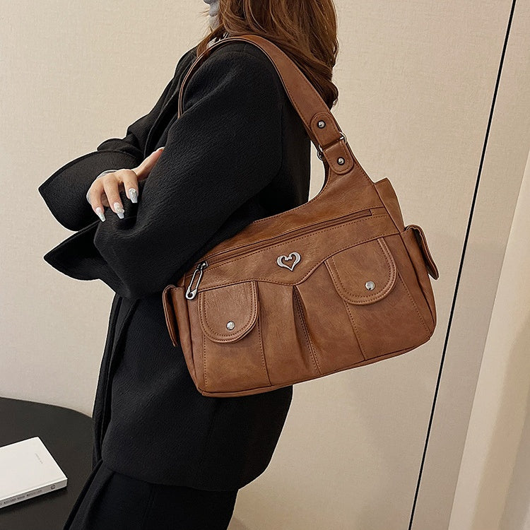 Damen-Tragetasche aus weichem Leder mit mehreren Taschen