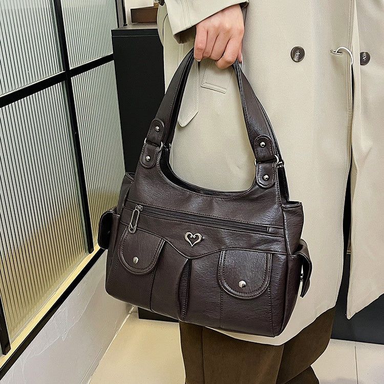 Damen-Tragetasche aus weichem Leder mit mehreren Taschen