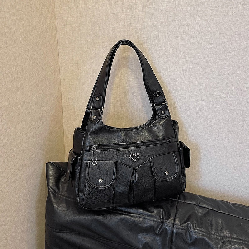 Damen-Tragetasche aus weichem Leder mit mehreren Taschen