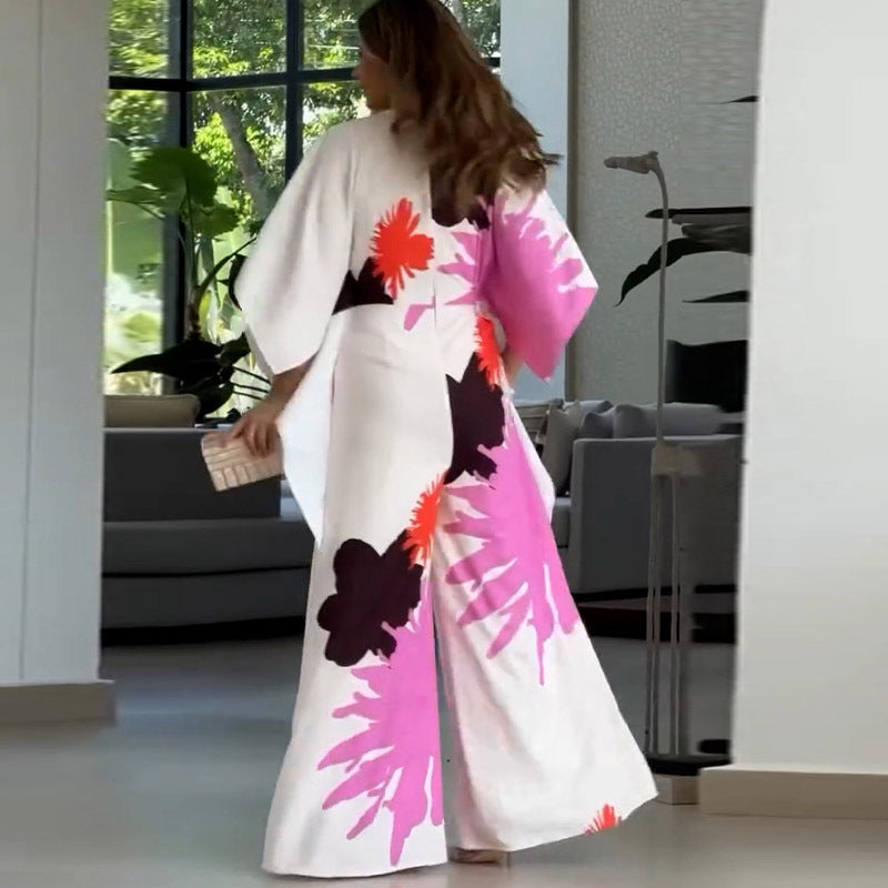 Jumpsuit mit V-Ausschnitt, Blumenmuster, unregelmäßigen Ärmeln und weitem Bein
