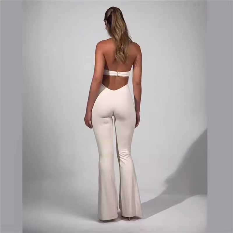 Unifarbener tief ausgeschnittener dehnbarer ärmelloser Jumpsuit