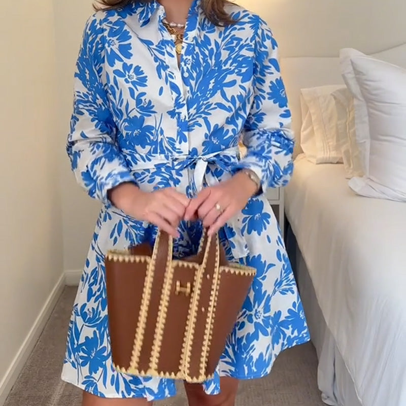 Elegantes blaues Kleid mit Blumendruck für Damen
