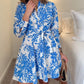 Elegantes blaues Kleid mit Blumendruck für Damen