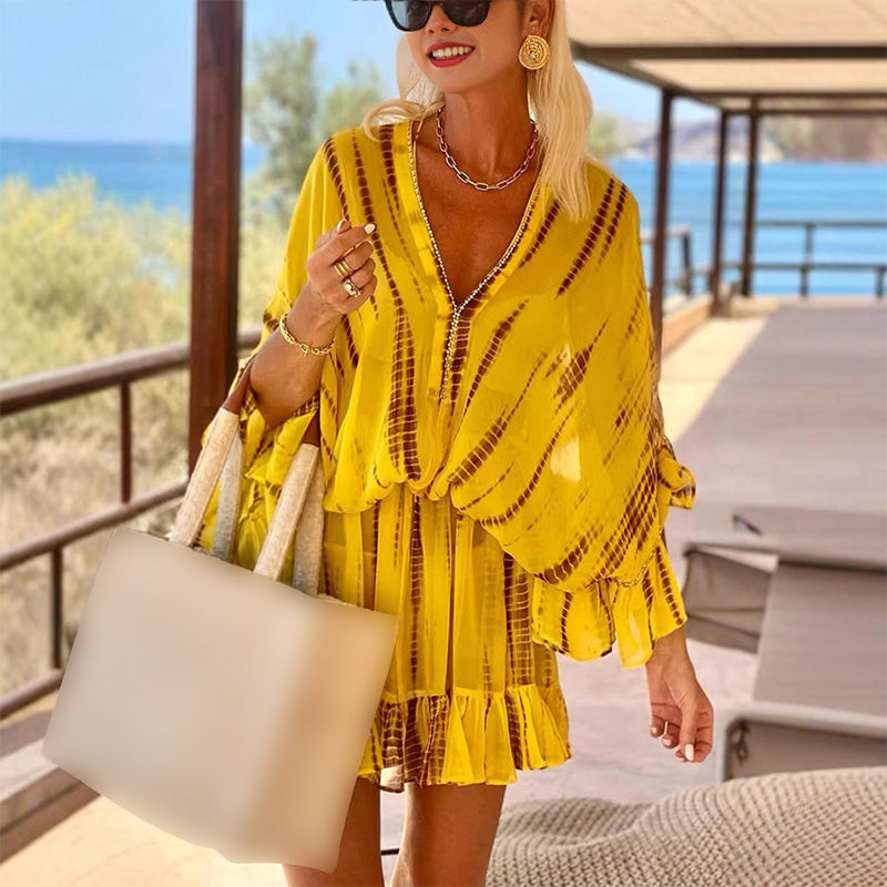 Gelbes, transparentes, seidiges Strandkleid mit tiefer Taille