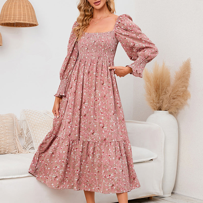 Elegantes Damenkleid mit ausgestellten Ärmeln und Blumenmuster