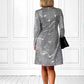 Anmutiges Langarmkleid mit Glitzerpailletten und V-Ausschnitt