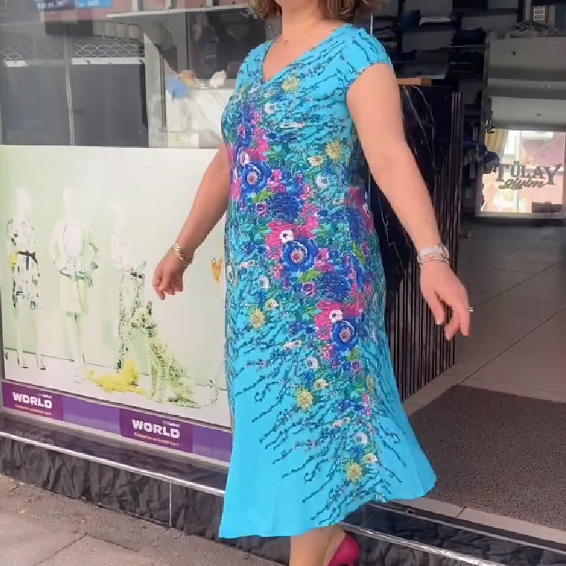 Fließendes Damenkleid mit Print und V-Ausschnitt
