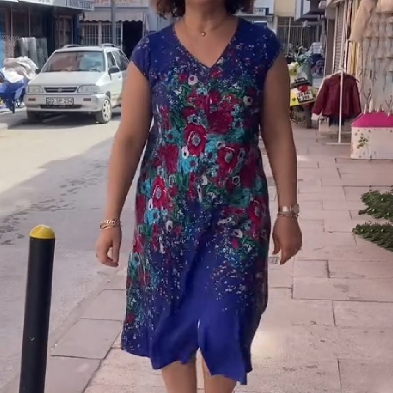 Fließendes Damenkleid mit Print und V-Ausschnitt