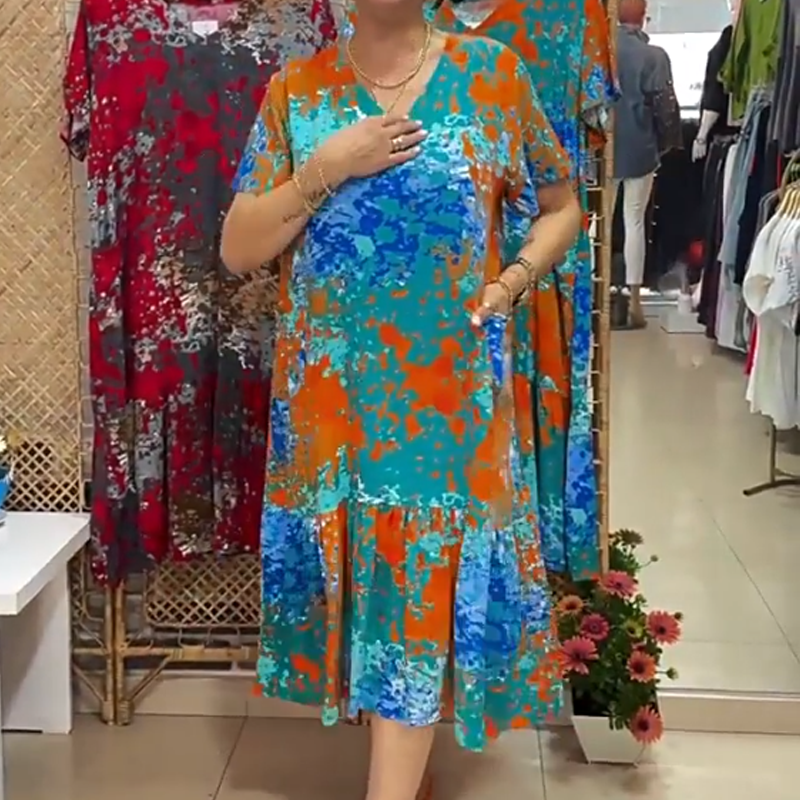 Bedrucktes Damenkleid mit V-Ausschnitt und plissiertem Saum