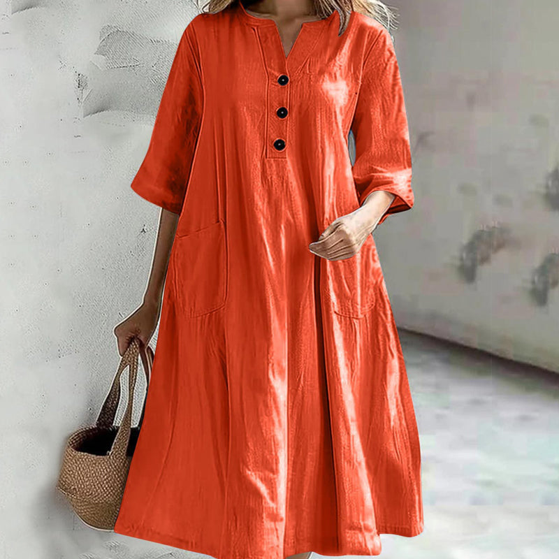Locker sitzendes Damenkleid mit V-Ausschnitt und Taschen