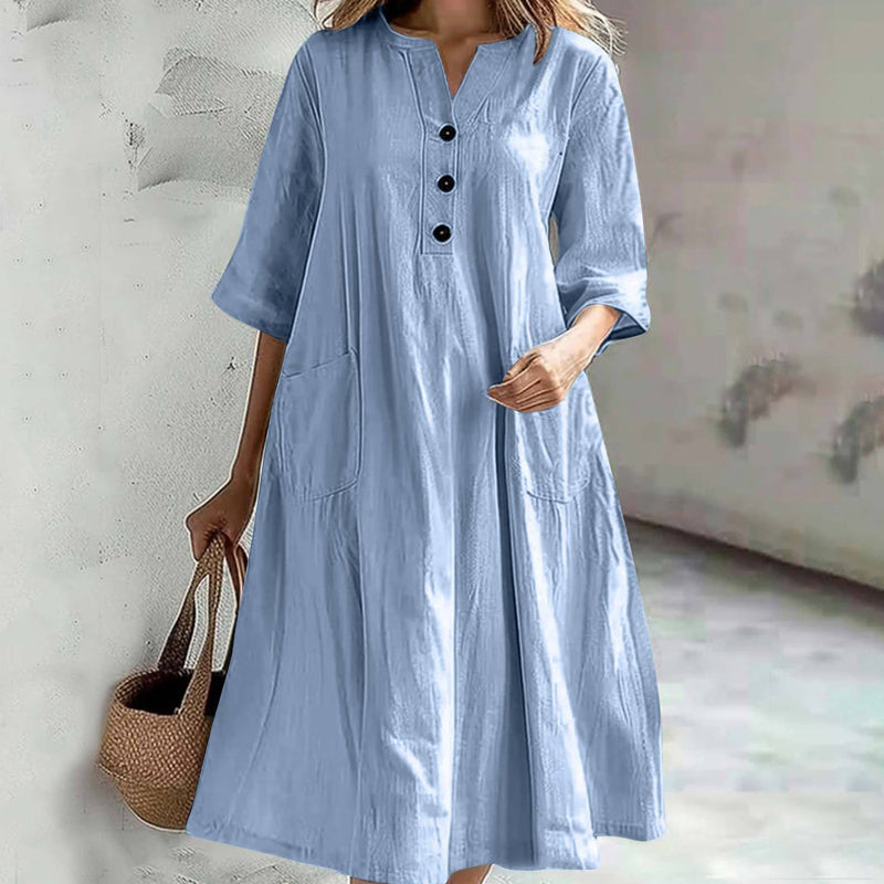 Locker sitzendes Damenkleid mit V-Ausschnitt und Taschen