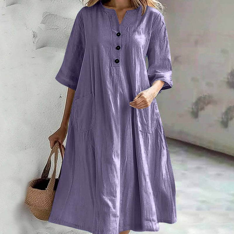 Locker sitzendes Damenkleid mit V-Ausschnitt und Taschen