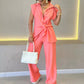 Elegantes Set aus tailliertem Oberteil und lässiger Hose