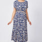 Trendy Damenkleid mit blauem Aufdruck, kurzärmlig, fließend und mit Gürtel
