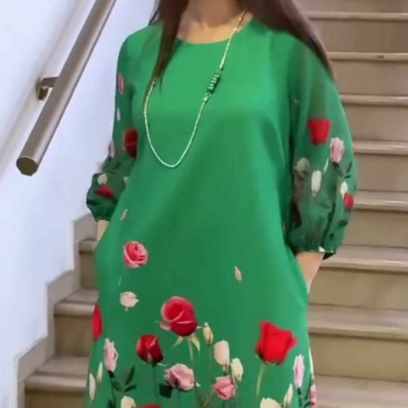 Elegantes Damenkleid mit Blumenmuster und Rundhalsausschnitt