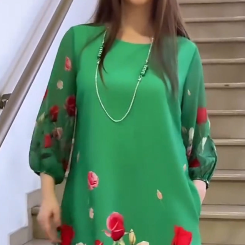 Elegantes Damenkleid mit Blumenmuster und Rundhalsausschnitt