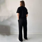Lässiges Set aus Oberteil mit Rundhalsausschnitt und Hose mit Kordelzug