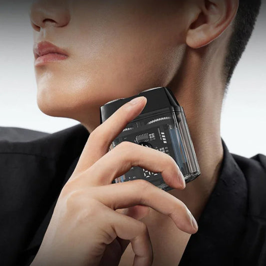 Tragbarer Mini-Elektrorasierer