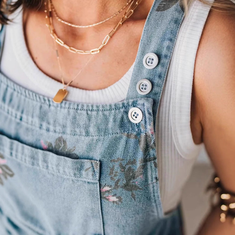Modischer Denim-Jumpsuit mit Vintage-Blumendruck