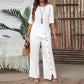 Zweiteiliges Damen-Set aus Top mit asymmetrischem Saum und Hose mit weitem Bein