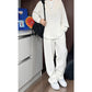 False – Zweiteiliges Set aus Hemd und Hose mit V-Ausschnitt
