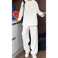 False – Zweiteiliges Set aus Hemd und Hose mit V-Ausschnitt