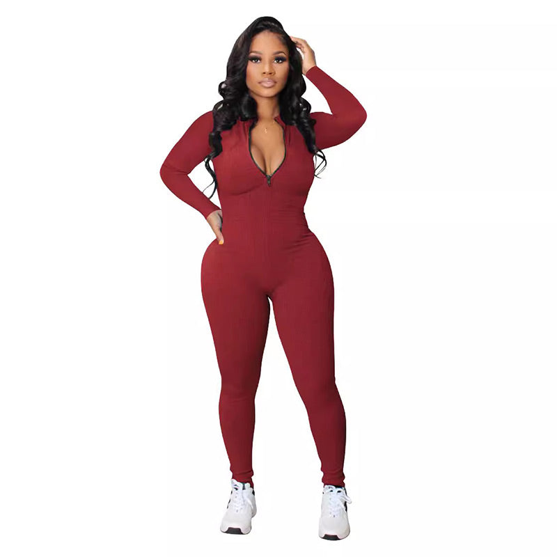Einfarbiger nahtloser Jumpsuit mit halbem Reißverschluss