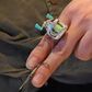 Halskette mit Miniatur-Angelrollen-Anhänger