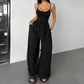 Jumpsuit mit Spaghettiträgern, weitem Bein und Taschen