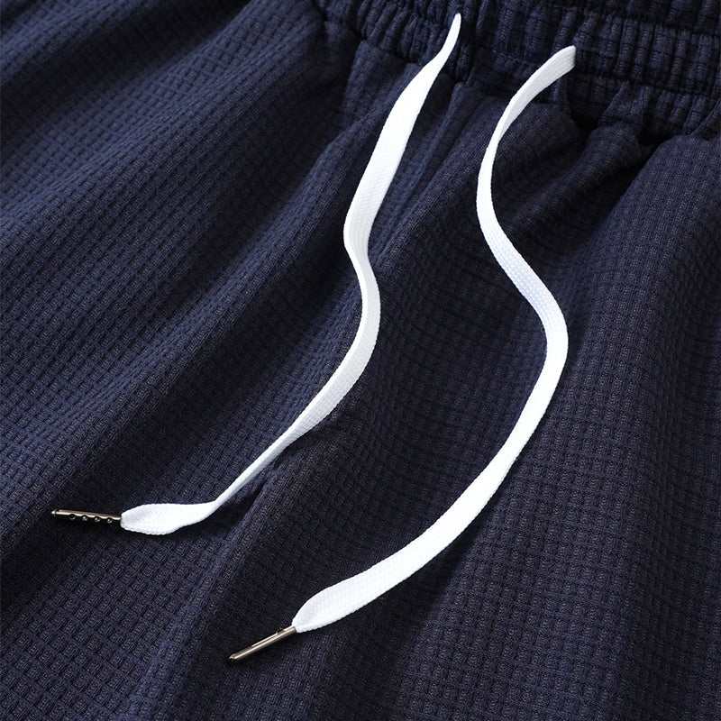 Herren Strick-Shorts mit Kordelzug und geometrischem Saum