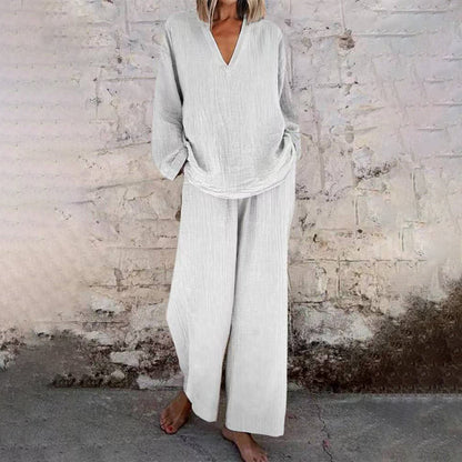 📢📢50%Rabatt!!!🎉✨Freizeitliches Set aus uni V-Ausschnitt Langarm-Top und Weitbein-Hosen