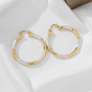 Elegante, gedrehte Creolen für Damen