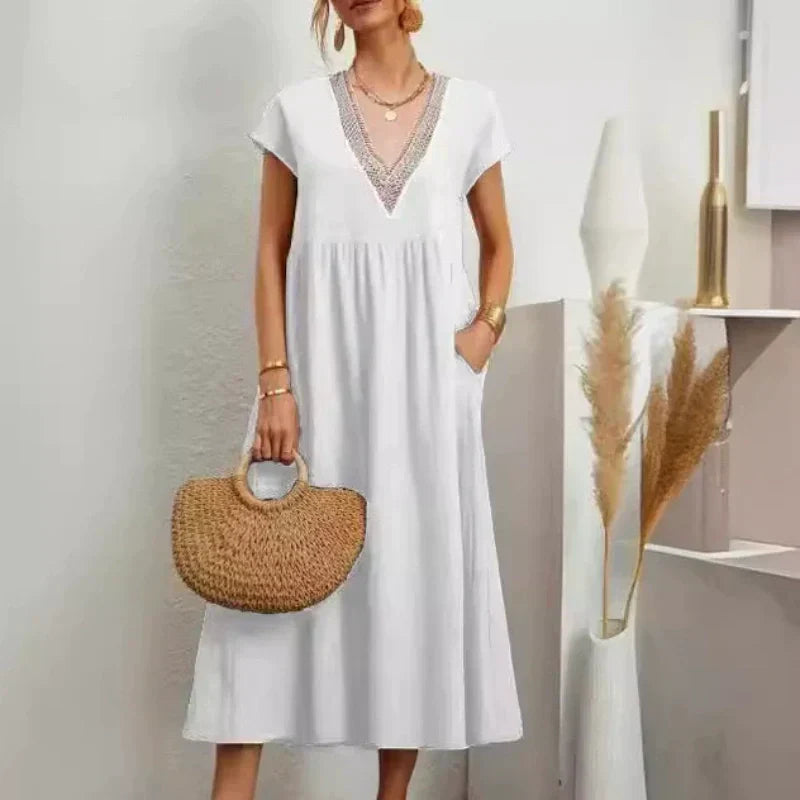 Elegantes Damenkleid mit V-Ausschnitt, kurzen Ärmeln und lockerer Passform
