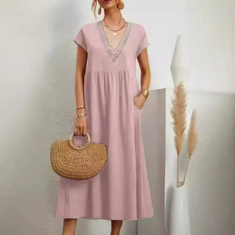 Elegantes Damenkleid mit V-Ausschnitt, kurzen Ärmeln und lockerer Passform