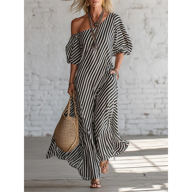 ☀️Damen Ein-Schulter-Streifen-Maxikleid – Fließender Puffärmel-Stil mit müheloser Sommer-Eleganz 🌿